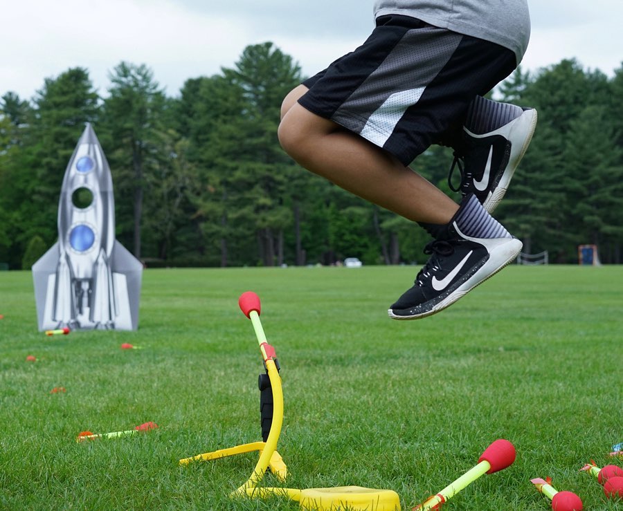 sporty kid jumping on a stomp rocket