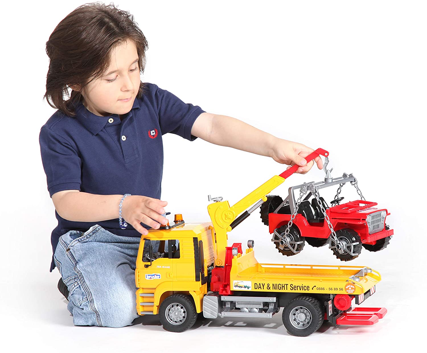 MAN TGA Tow Truck with Cross Country Vehicle by Bruder 6