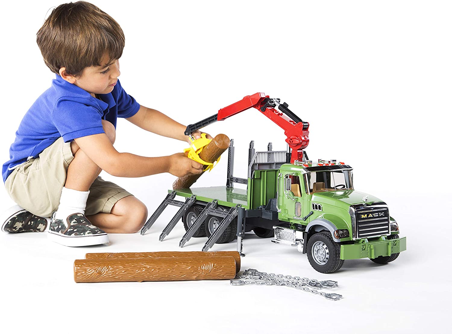 Mack Granite Timber Truck with Loading Crane and 3 Logs by Bruder 4